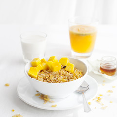 Healthy breakfast. Corn flakes, muesli, granola, with fresh orange juice