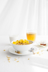 Healthy breakfast. Corn flakes, muesli, granola, with fresh orange juice