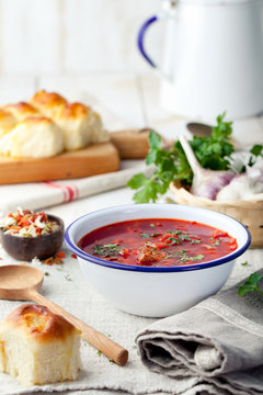 Traditional Ukrainian Russian vegetable soup, borsch with garlic donuts, pampushki.