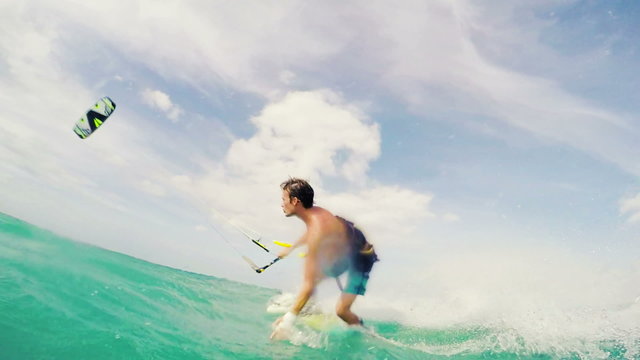 Young Man Kitesurfing in Ocean. Extreme Summer Sport HD. Slow Motion.