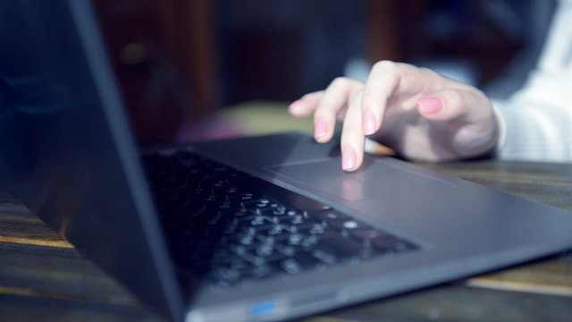 Woman hands typing on a computer keyboard
