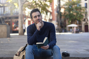 Obraz premium Young man taking photos in Barcelona