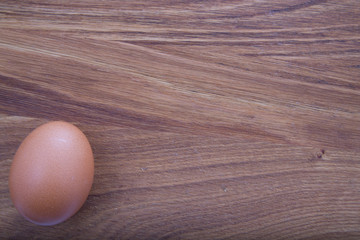 brown egg on wood