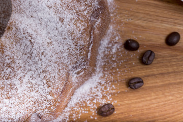  piece of cake on a wooden board closeup