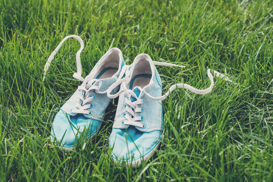 sneakers on grass