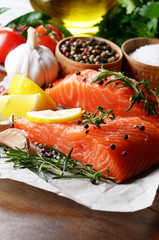 Raw salmon on baking paper