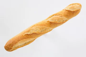 Fotobehang French bread baguette on a white background, made from flour. baking, top view, side view. space for text .. © beverli
