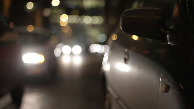 Cars passing by at night