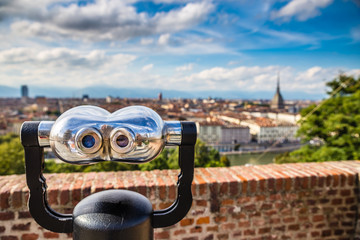 Binoculars and Turin city centre behind-Turin,Italy