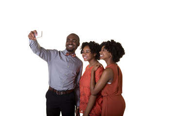 Siblings or group of friends taking a picture with a cell phone isolated on white