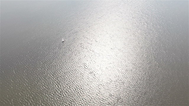 Lone yacht at sea