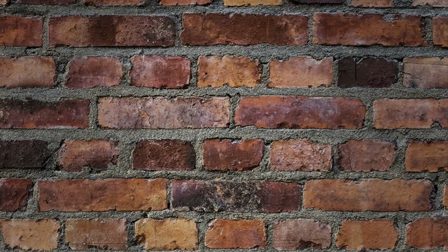 Old brick wall. Traveling vertically, from top to bottom. Animated still picture.