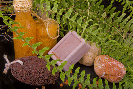 orange-brown spa composition of natural soap, sea salt body scru