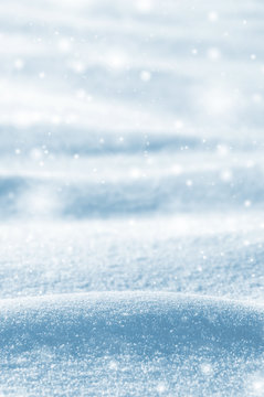Winter background with snowdrifts and brilliant snow