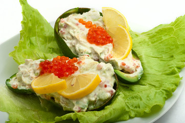red caviar with avocado and salad