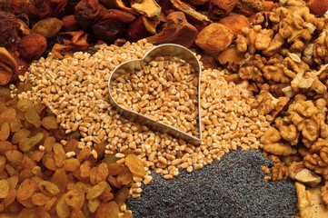 wheat groats in a canvas bag with dried fruit, walnuts, poppy se