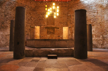 5 stone sentinels in the crypt of an old roman church