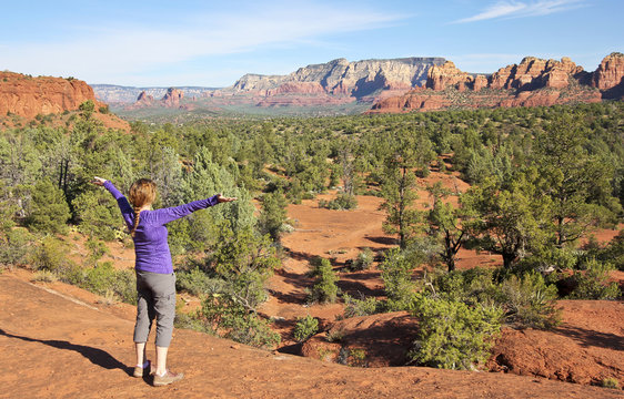 A Woman Rejoices in the Sedona Beauty