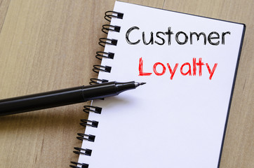 Customer loyalty write on notebook