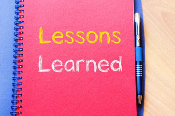 Lessons learned write on notebook