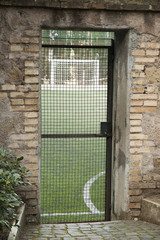 football goal,gate,cobblestones