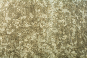 Polished metal surface photographed close-up.

