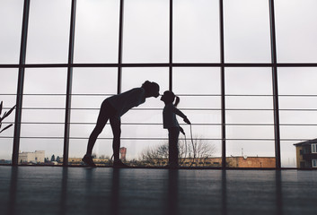 Charming family spends time in the gym