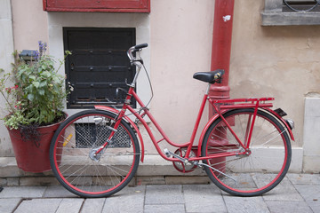 Fototapeta na wymiar Red Bicycle in Warsaw, Poland