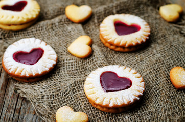 Shortbread with the shape of a heart and berry jam