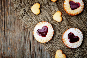 Shortbread with the shape of a heart and berry jam