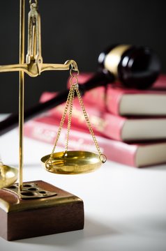 Law composition with scale and gavel on books