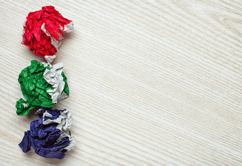 crumpled colorful paper ball
