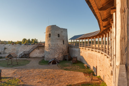View from the fortress wall of the ancient fortress in Izborsk on the interior of the summer evening