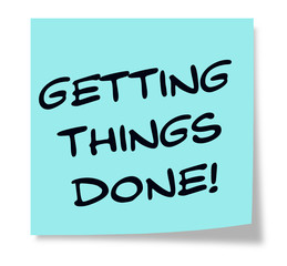 Getting Things Done written on a blue sticky note