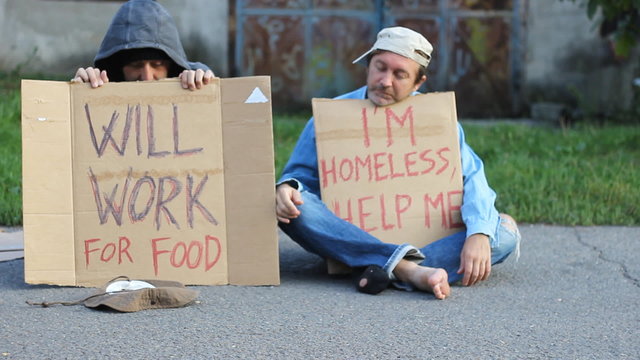 homeless man on street begg