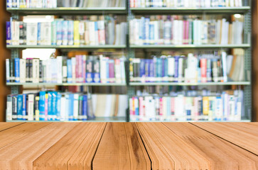 Empty wooden table and modern library background, product displa