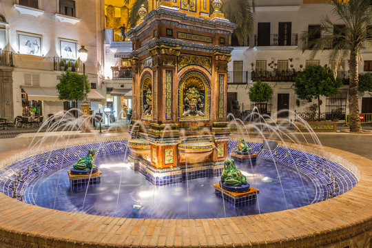 The main square in Vejer de la Frontera, featuring a beautiful fountain with colorful ceramic tiles, Cadiz, Spain
