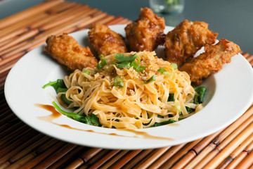 Chicken Wings with Noodles and Spinach