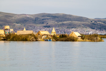 Fototapeta na wymiar One of Uros floating islands, Titicaca lake, Peru