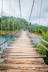 Fototapeta na wymiar Wooden suspension bridge in Guatape, Colombia