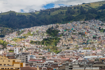 Fototapeta na wymiar Houses on hills in Quito, Ecuador