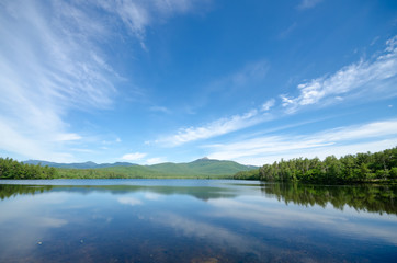 Fototapeta na wymiar Idyllic Mountain Lake on Sunny Summer Day - Lake Chocorua in New Hampshire