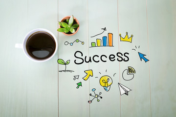 Success concept with a cup of coffee