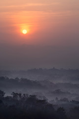 Sun above Borobudur, view from Setumbu  hill