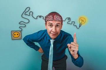 businessman smiling and raised his index finger up brain booster