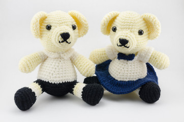 Boy and girl bear crochet doll isolated