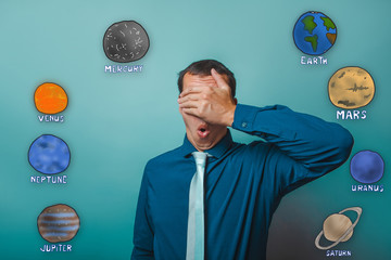 businessman put his hand over his eyes and opened his mouth surp
