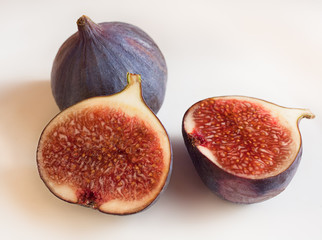 Juicy figs on white background