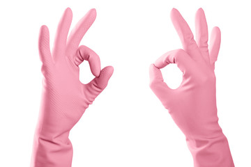 Hands in pink rubber cleaning gloves isolated on white