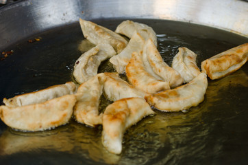 making Gyoza (Japanese Dumplings) in frying pan